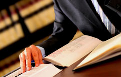 picture of attorney, papers and books